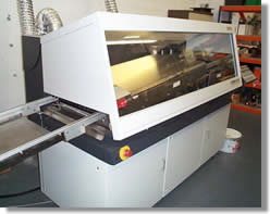 Automatic flow solder machine